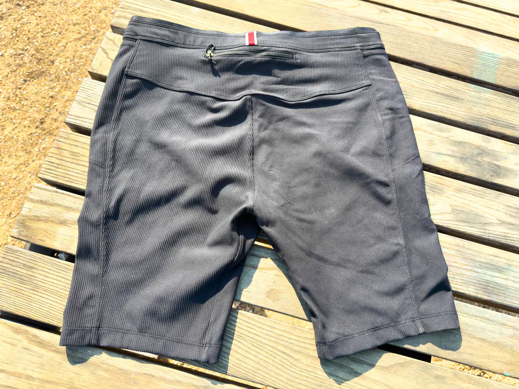 A top down view of the rear of the half tights, with the small zippered rear pocket visible.