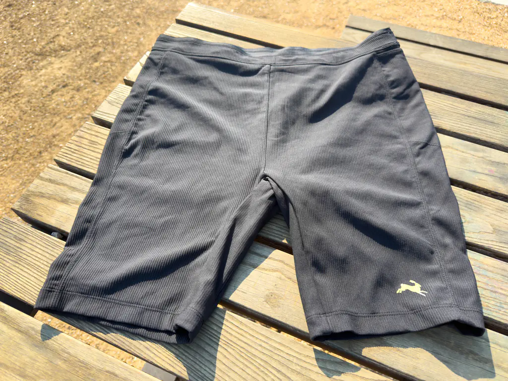 A top down view of the front of the half tights, showing the unique, lightly ribbed fabric.