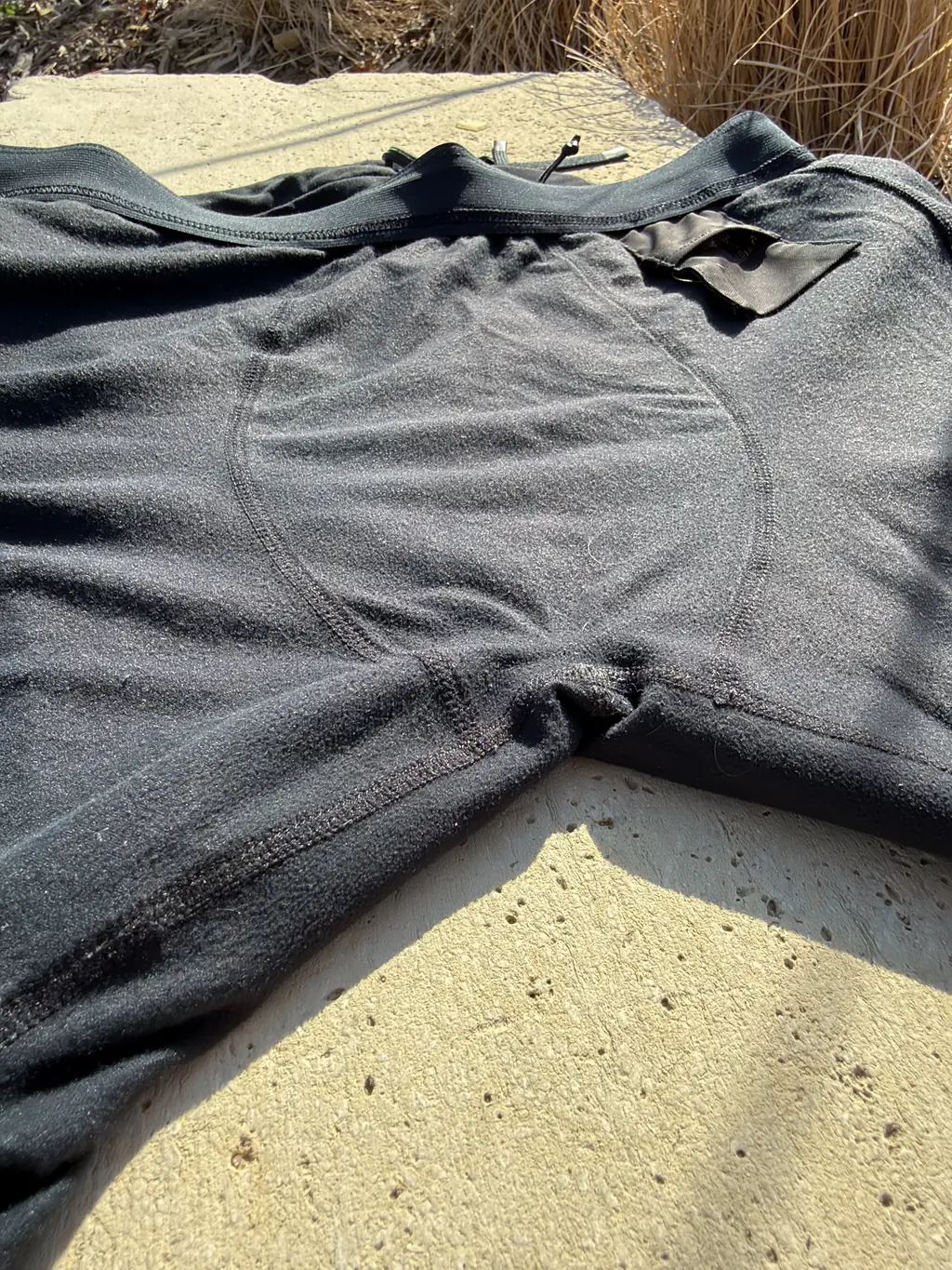 A view of the interior crotch construction, showing no gusset and many seams coming together