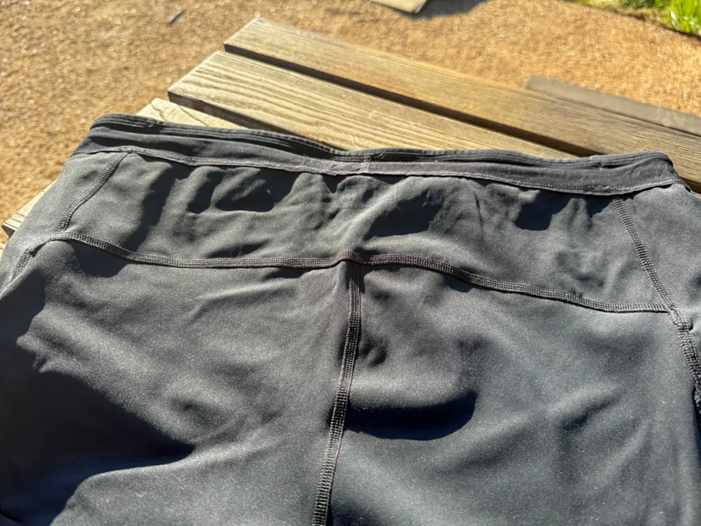 A shot of the interior construction where the rear pocket sits, showing minimal, flat seams.