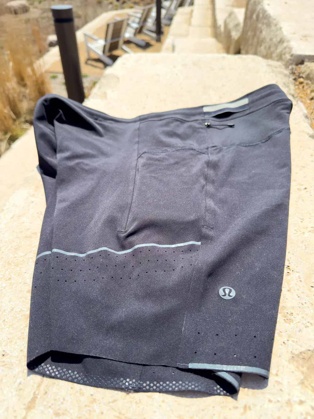 The left side of the half tights, showing one of the drop in pockets