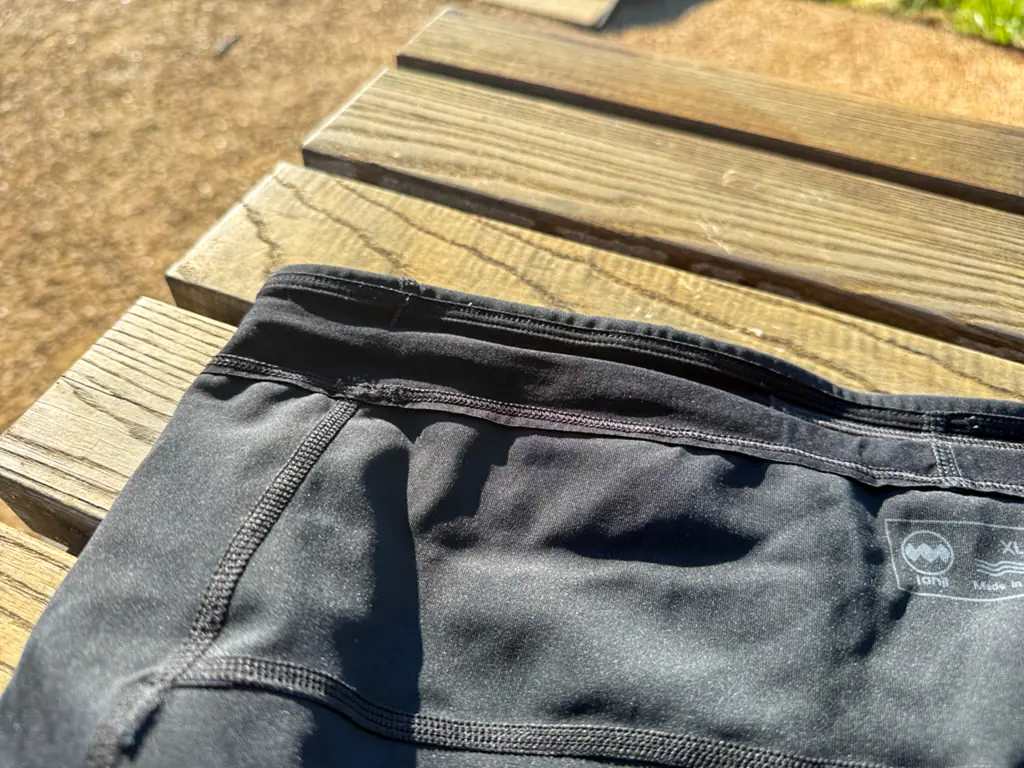 A closeup of the simple, minimally padded waistband.