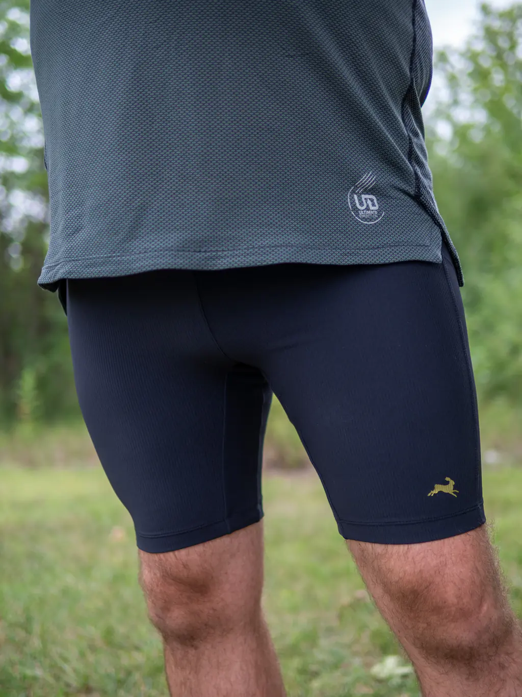 A front shot of a bigger runner wearing the half tights.
